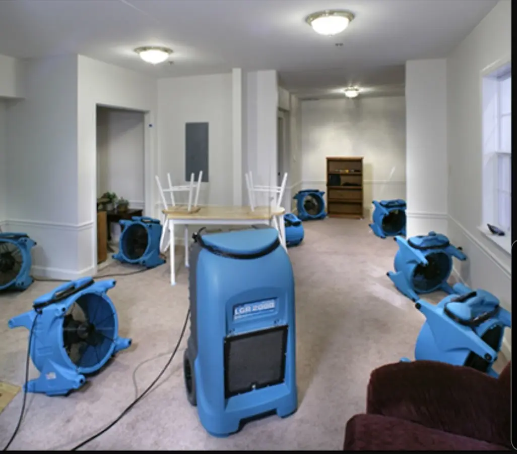 Air movers and dehumidifier setup for Water Damage Restoration in Conway